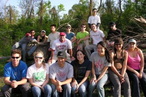 Dr. Sean Anderson (center) and his students in Environmental Science and Resource Management from California State University Channel Islands pause for a picture after two days of conducting a Native and Invasive Plant survey at Woodlands Trail and Park in Belle Chasse